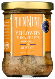 Indulge in the savory richness of Tonnino Yellowfin Tuna Fillets, hand-packed with real garlic pieces, and bathed in premium olive oil. Perfectly preserved in a glass jar for a delectable taste of Mediterranean flavors.
